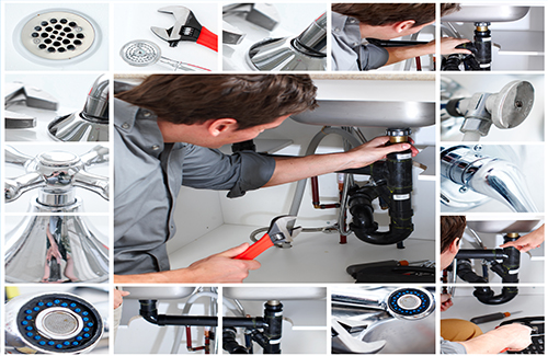 Young plumber fixing a sink